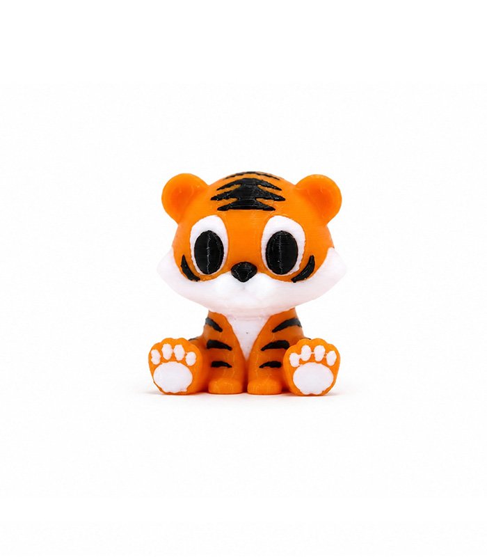 Zookies Baby Tiger: seated orange tiger cub with black stripes and large eyes