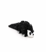 Zookies Articulated Baby Otter: black otter figure with a white face and long tail